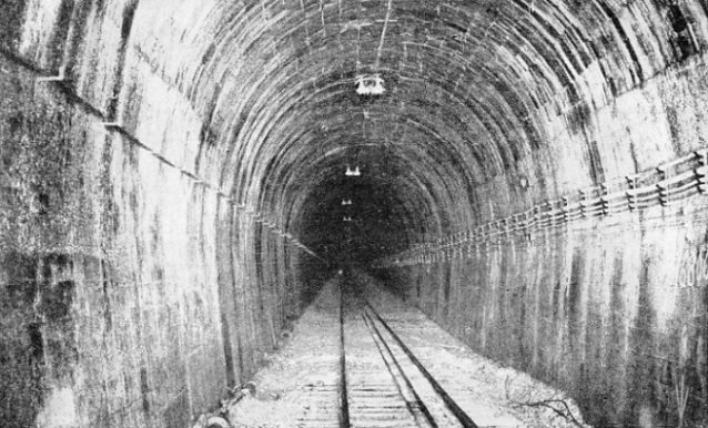 DEAD STRAIGHT FROM END TO END, the Otira Tunnel has a total length of 5 miles 445 yards