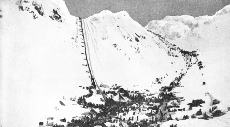 Two lines of gold-seekers climbing over the Chilcoot Pass on their way to the Klondike River