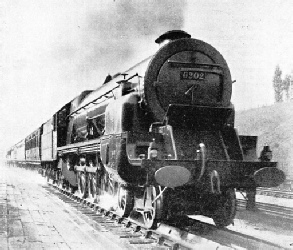 LMS TURBINE LOCOMOTIVE taking water at Bushey (Herts) troughs