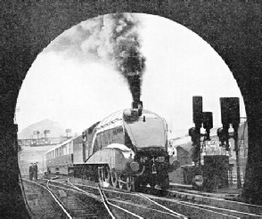 SETTING OUT FROM LONDON on its test run of June 30, 1937, the “Coronation”, headed by No. 4489, Dominion of Canada