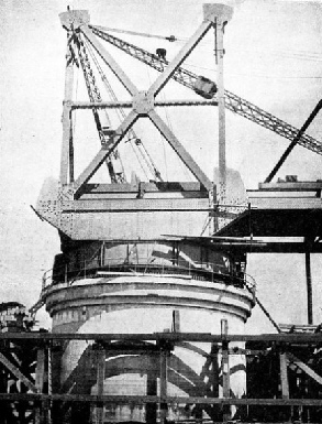 STEELWORK BEING ERECTED on the centre of the swing span of Kiincardine Bridge