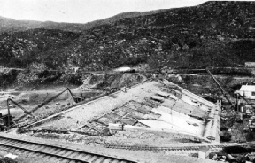 AN EARTH AND ROCK FILL DAM built to retain the waters of Loch Treig