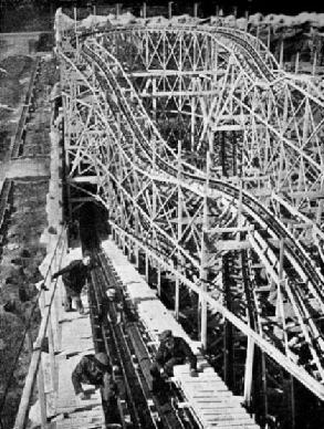 LAYING THE PULL-UP CHAIN on a new gravity ride, or coaster, at Felixstowe