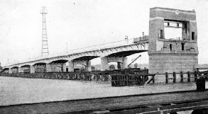 A MASSIVE CONCRETE PORTAL is built above the pier abutting on the swing span of Kincardine Bridge