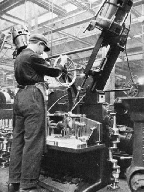 CRANKSHAFTS BEING DRILLED in the Morris machine shop at Coventry