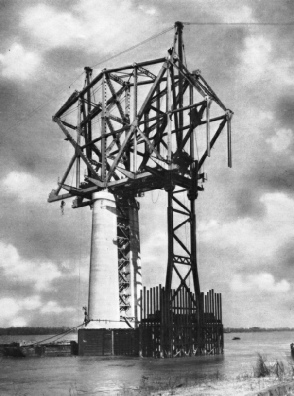 BUILDING OUT THE SUPERSTRUCTURE of the Huey Long Bridge