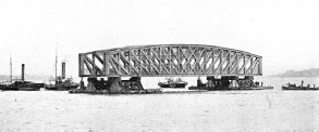 TOWING ONE OF THE 245-FEET SPANS of the new Tay Bridge on pontoons