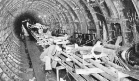 ELECTRIC CABLES are carried beneath the River Thames in a tunnel from Deptford Power Station