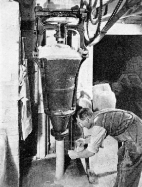 THE PUG MILL is a device resembling in its operation a large power-driven mincing machine