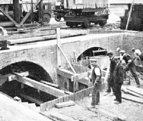 RISING TO THE SURFACE, the railway emerges from the twin tube tunnels 