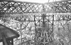 THE INTRICATE MASS OF IRONWORK at the level of the first platform of the Eiffel Tower
