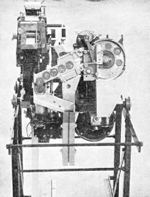 OPERATED BY COPPER COINS, this mechanism is used in ticket-issuing machines