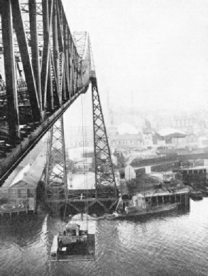 AT MIDDLESBROUGH, YORKSHIRE, a transporter bridge has been built across the River Tees