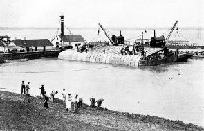 Work on the sinking of a huge articulated concrete mattress at Gayoso Bend revetment