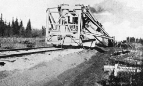 DITCHING MACHINE AT WORK during the building of the Hudson Bay Railway