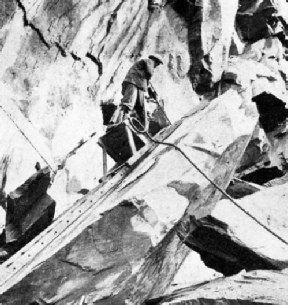 PNEUMATIC DRILL at work on the quarry face at Elterwater