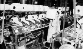 IN THE COMBING MACHINE, the ropes of cotton are run together