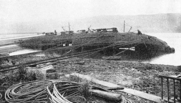 TEN MILES OF STEEL CABLES were used to haul the wrecked dredger Silurus into an upright position