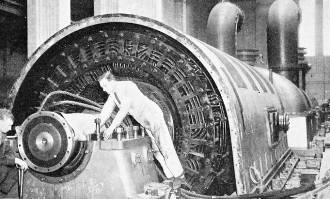 Erecting the stator for one of the turbo-alternators in Battersea Power Station