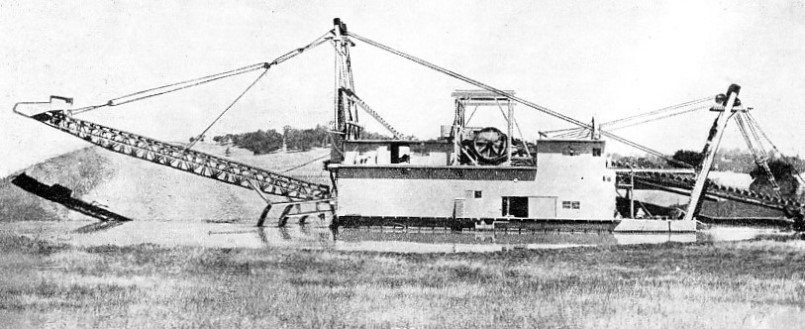 A PLACER DREDGE carries out all the operations of the old-fashioned placer methods
