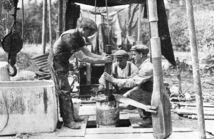 AT WORK ON A 12-IN DIAMETER ARTESIAN WELL BORING