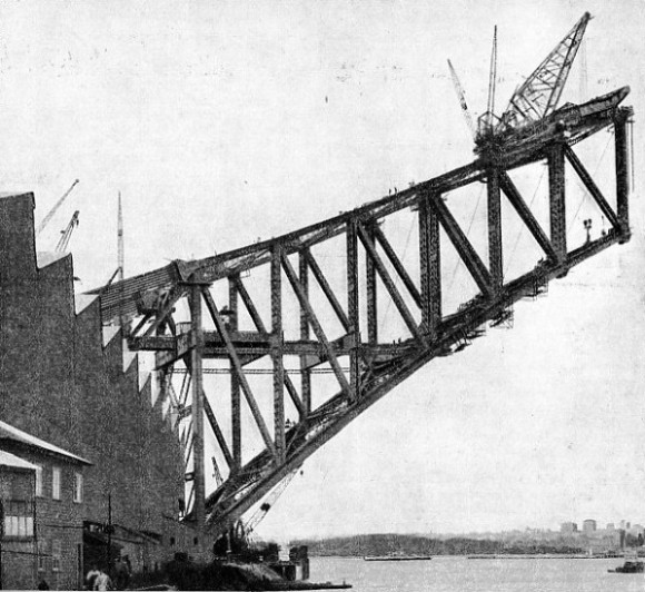 CREEPER CRANE building one of the half-arches of Sydney Harbour bridge