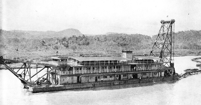 COMBINED PILEDRIVER AND DREDGER at work in the Panama Canal.