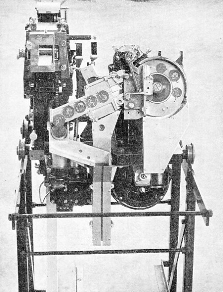 OPERATED BY COPPER COINS, this mechanism is used in ticket-issuing machines