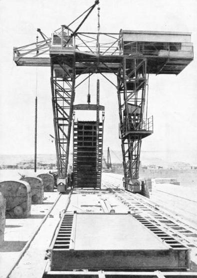 ONE OF THE SLUICE GATES of the rebuilt Aswan Dam