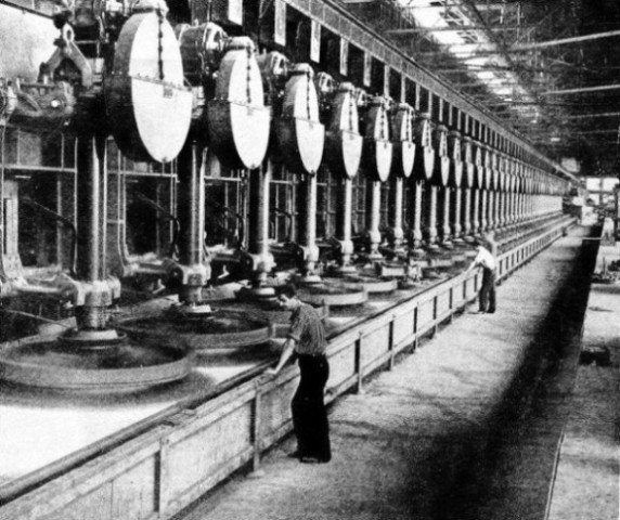 POLISHING PLATE GLASS in an American glassworks