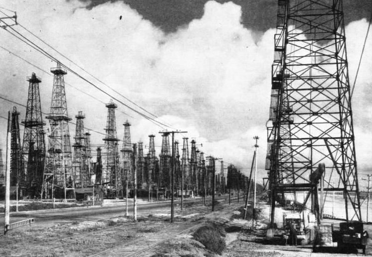 RAILWAY AND ROAD IN AN OILFIELD on the ocean front near Los Angeles