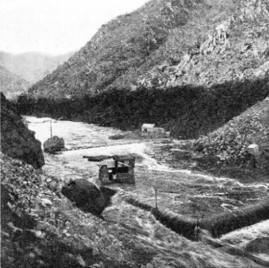 SEVERE FLOODS often seriously impeded work on the Burrinjuck Dam