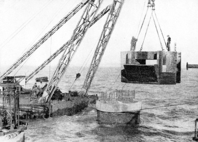 SPECIALLY DESIGNED CONCRETE CAPS were fitted to the upper end of the sunken concrete cylinders