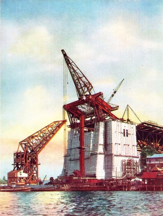 THE FIRST PANEL of the great arch of Sydney Harbour bridge being built