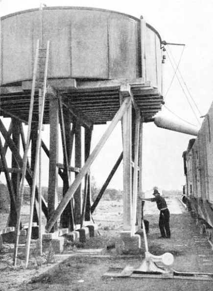 LARGE WATER TANK from which locomotives draw water on the long journeys across the arid regions of the Australian continent