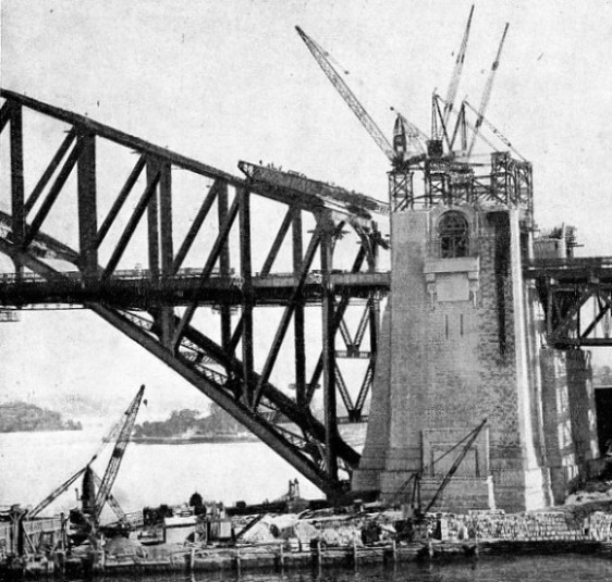 DISMANTLING one of the creeper cranes after completion of the arch of the Sydney Harbour bridge