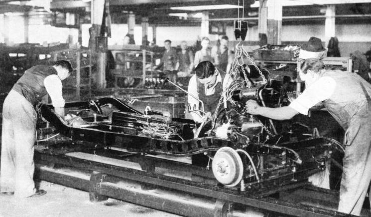 IN THE MAIN ASSEMBLY LINE in the Morris works at Cowley, Oxford