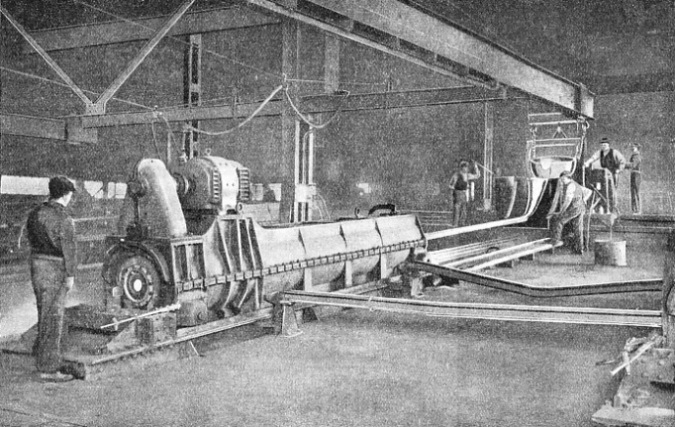 CASTING IRON PIPES by a centrifugal process in the Stanton Ironworks