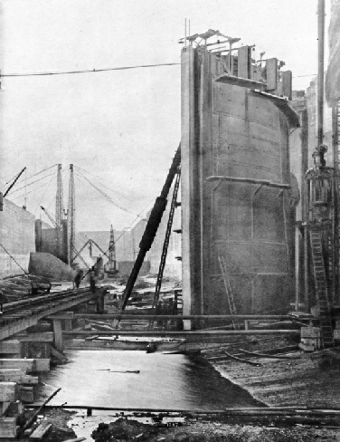 STEEL LOCK GATES being erected in the entrance lock to King George V Dock