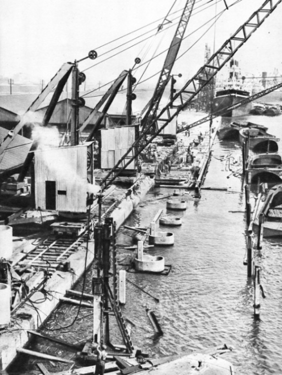 WIDENING THE QUAYS on the north side of Royal Albert Dock 