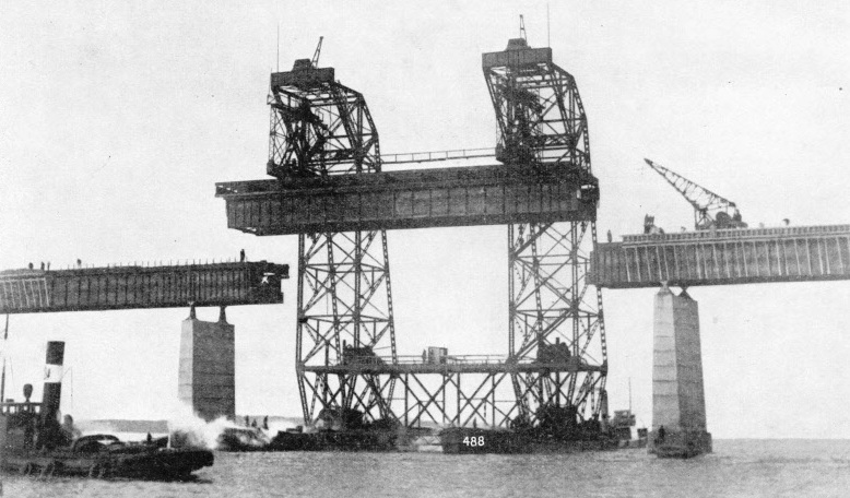 A GIANT FLOATING CRANE was used to lower the suspended spans of the Storstrom Bridge into position